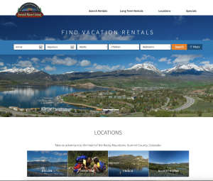 View of the Homepage for Summit Resort Group showing a dronve overview of Dillon, Frisco and Silverthorne featuring Lake Dillon